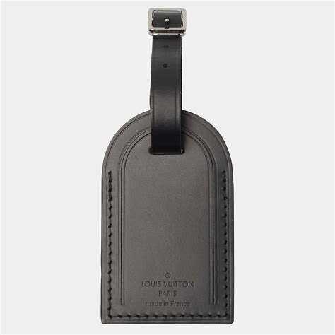 black leather luggage name tag.